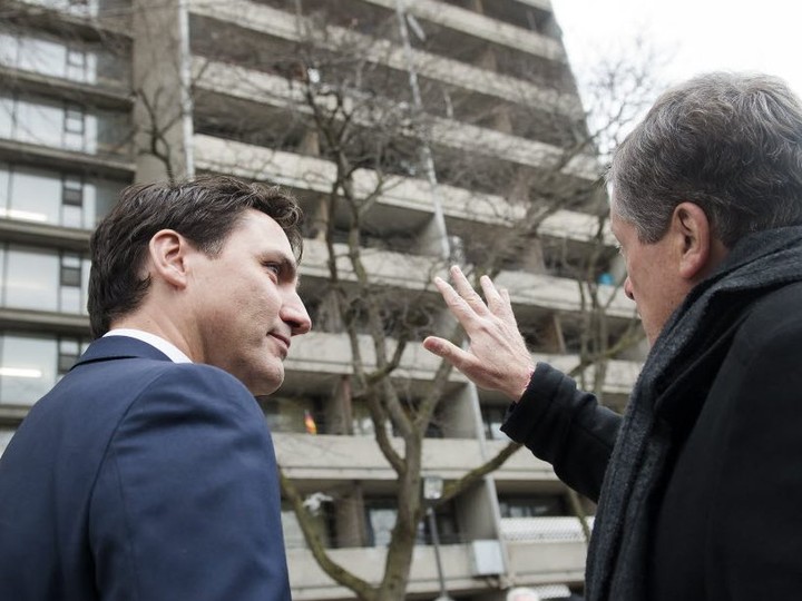  Prime Minister Justin Trudeau, left, speaks with Toronto Mayor John Tory before a press conference announcing funding for social housing at 140 Adanac Dr. in Scarborough on April 5, 2019.