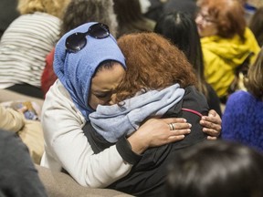 A woman breaks down in tears during the ceremony to remember the victims of the Yonge St. van attack on April 23, 2019. (Craig Robertson, Toronto Sun)