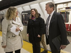 Mayor John Tory and TTC Chair Jaye Robinson are pictured at Bloor-Yonge station on April 3, 2019. (Stan Behal, Toronto Sun)