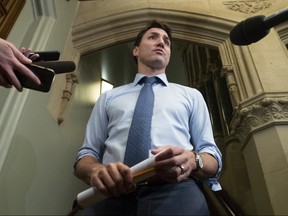 Canadian Prime Minister Justin Trudeau speaks with media before caucus on April 3, 2019. (THE CANADIAN PRESS)