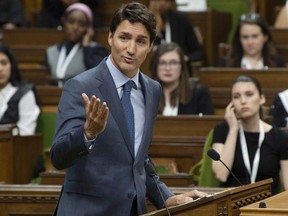 Prime Minister Justin Trudeau gestures to a delegate for a question following his speech to Daughters of the Vote in the House of Commons on April 3, 2019. (THE CANADIAN PRESS)