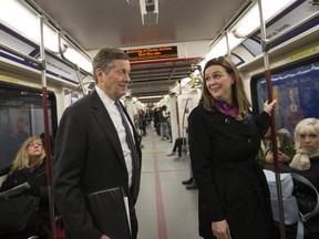 Toronto Mayor John Tory and Councillor Jennifer McKelvie ride the subway on April 3, 2019. (Stan Behal, Toronto Sun)