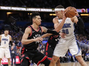 Raptors' Danny Green defends against Orlando Magic forward Aaron Gordon during Sunday's game. (GETTY IMAGES)