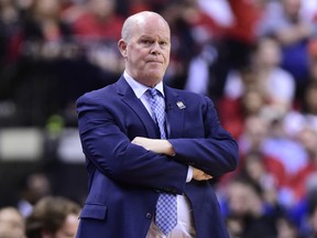 Orlando Magic head coach Steve Clifford watches as his team plays the Raptors on Tuesday night. (THE CANADIAN PRESS)