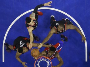 Philadelphia 76ers’ Jimmy Butler (bottom right) says Raptors guard Kyle Lowry (left) is “his guy.” (AP Photo)