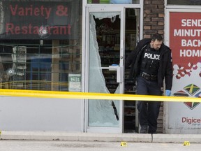 Police investigate a shootout on Jane St. on April 9, 2019. (Craig Robertson, Toronto Sun)