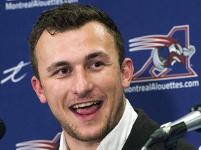 In this July 23, 2018, file photo, Montreal Alouettes quarterback Johnny Manziel speaks to the media after practice in Montreal.