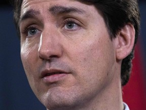 In this file photo taken on March 07, 2019 Canadian Prime Minister Justin Trudeau speaks to the media at the national press gallery in Ottawa, Ontario.