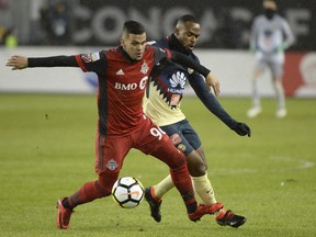 Toronto FC defender Auro (left) brings a lot to the club. (Nathan Denette/The Canadian Press)