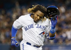 Toronto Blue Jays rookie Vladimir Guerrero Jr. reacts to a long flyout against the Oakland Athletics during the fourth inning of MLB baseball action in Toronto, Friday April 26, 2019. THE CANADIAN PRESS/Mark Blinch