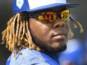 Toronto Blue Jays infielder Vladimir Guerrero Jr. wll make his debut on Friday against the A's.
 THE CANADIAN PRESS/Nathan Denette