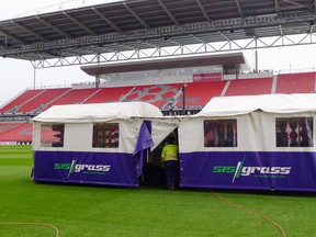 The SIS Grass machine used to stitch in artificial fibres to strengthen the natural grass at BMO Field. (Neil Davidson/The Canadian Press)