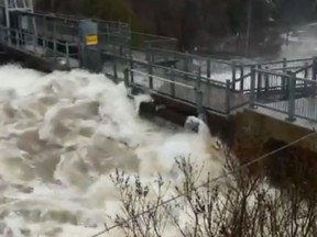 Water rushes up against the dam at Bracebridge falls in Bracebridge on April 19, 2019. (GraydonTheMayor/Twitter)