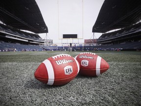 New CFL balls are photographed at the Winnipeg Blue Bombers stadium in Winnipeg Thursday, May 24, 2018. (THE CANADIAN PRESS/John Woods)