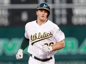 Matt Chapman of the Oakland Athletics trots around the bases after hitting a solo home run against the Texas Rangers on April 23, 2019. (THEARON W. HENDERSON/Getty Images)