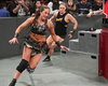 Ronda Rousey chases Sarah Logan in a recent match. WWE