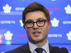 Kyle Dubas, the 33-year-old general manager of the Maple Leafs, has some challenging months ahead trying to fit players in under the salary cap. (Veronica Henri/Toronto Sun)