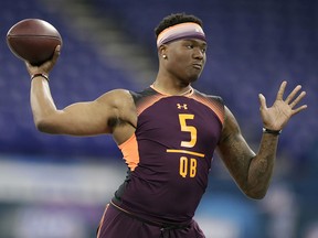 In this March 2, 2019, file photo, Ohio State quarterback Dwayne Haskins runs a drill at the NFL scouting combine, in Indianapolis. (AP Photo/Michael Conroy, File)