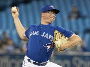 Toronto Blue Jays starting pitcher Trent Thornton throws against the Tampa Bay Rays during first inning American League MLB baseball game in Toronto Friday April 12, 2019. THE CANADIAN PRESS/Fred Thornhill