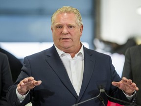 Ontario Premier Doug Ford addresses media at the Thorncrest Ford dealership, near The Queensway and Hwy. 427, in Toronto on Monday, April 1, 2019. (Ernest Doroszuk/Toronto Sun/Postmedia)