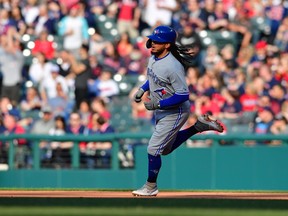 The Jays’ Freddy Galvis rounds the bases on a solo home run during the fifth inning against the Cleveland Indians at Progressive Field yesterday. (Getty images)