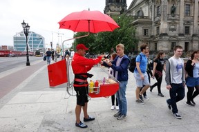 Sampling one of Germany’s hundreds sausage varieties from a street vendor is a classic German experience. (Rick Steves)