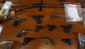 Toronto Police Chief Mark Saunders showed off some of firearms and ammunition handed over by the public in a previous gun amnesty program on Wednesday, November 25, 2015. Many of the guns depicted cannot be legally owned in Canada (Jack Boland/Toronto Sun/Postmedia Network)