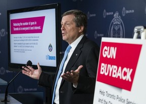 Toronto Mayor John Tory and Police Chief Mark Saunders announce new Gun Buyback program at police headquarters on Friday, April 26, 2019. (Craig Robertson/Toronto Sun/Postmedia Network)