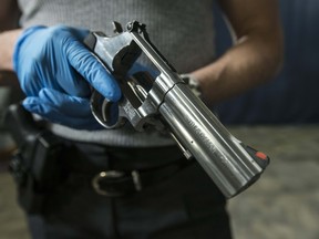 File photo of a handgun seized by Toronto Police during Project Kronic in 2017. (Craig Robertson/Toronto Sun/Postmedia Network)