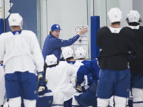 Toronto Maple Leafs head coach Mike Babcock, centre, runs drills during practice in Toronto on Monday, April 8, 2019. The Maple Leafs take on the Boston Bruins in the first round of the Stanley Cup playoffs. THE CANADIAN PRESS/Nathan Denette