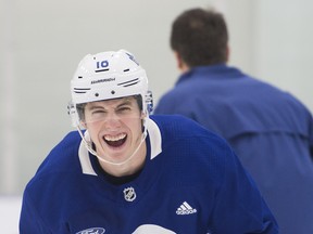 Toronto Maple Leafs right wing Mitch Marner laughs during practice earlier this week.  THE CANADIAN PRESS/Nathan Denette