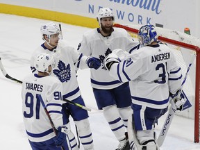 Leafs blueliners Jake Muzzin (second from right) and Nikita Zaitsev (second from left) worked well together in Game 1. (AP)