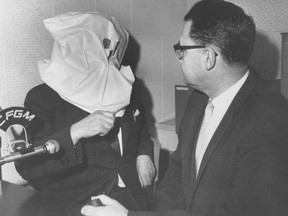 A hooded Igor Gouzenko conducts an interview in Ken Ross in 1968 for Toronto radio station CFGM, the predecessor to today's Global News Radio 640.