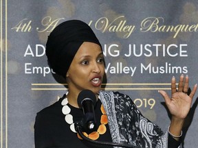 In this March 23, 2019, photo, Rep. Ilhan Omar, D-Minn., speaks at a dinner banquet, part of a fundraising event for the Council of American-Islamic Relations of Greater Los Angeles at the Hilton hotel in Woodland Hills, Calif.  (Gary Coronado/Los Angeles Times via AP)