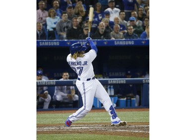 Toronto Blue Jays Vlad Guerrero Jr. 3B (27) hammers a ball in the third inning to the left field corner for an out  in Toronto, Ont. on Friday April 26, 2019. Jack Boland/Toronto Sun/Postmedia Network