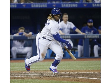 Toronto Blue Jays Vlad Guerrero Jr. 3B (27) hits a grounder for a double In the ninth inning in Toronto, Ont. on Friday April 26, 2019. Jack Boland/Toronto Sun/Postmedia Network