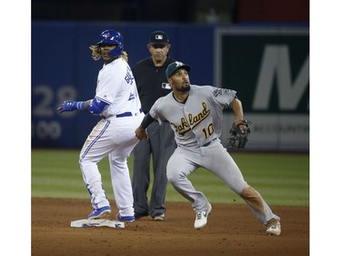 Toronto Blue Jays Vlad Guerrero Jr. 3B (27) hits a grounder for a double In the ninth inning in Toronto, Ont. on Friday April 26, 2019. Jack Boland/Toronto Sun/Postmedia Network