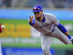 Toronto Blue Jays' Lourdes Gurriel Jr. flips the ball to first base to get out Cleveland Indians' Jake Bauers in the sixth inning on Saturday, April 6, 2019, in Cleveland. (AP PHOTO)