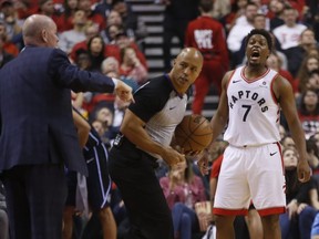 Raptors point guard Kyle Lowry reacts to a ref's call on Tuesday night against the Orlando Magic. (Jack Boland/Toronto Sun)
