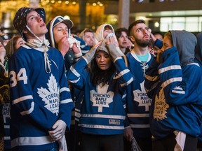 Buds fans had their hearts crushed watching on the big screens outside Scotiabank Arena as the Toronto Maple Leafs lose to the Boston Bruins in Game 7 of the First Round playoffs on Tuesday, April 23, 2019. (Ernest Doroszuk/Toronto Sun/Postmedia)