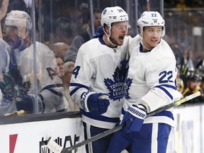 Leafs' Auston Matthews (34) celebrates his goal with Nikita Zaitsev during the third period in Game 5 of an NHL hockey first-round playoff series against the Boston Bruins in Boston, Friday, April 19, 2019. (AP Photo/Michael Dwyer)