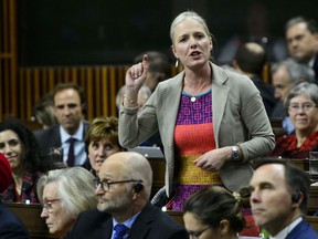 Minister of Environment and Climate Change Catherine McKenna stands in the House of Commons during question period on Parliament Hill in Ottawa on Tuesday, April 9, 2019. THE CANADIAN PRESS/Sean Kilpatrick