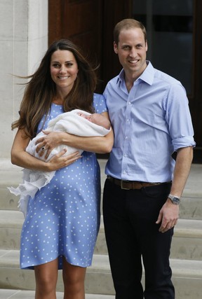 Britain’s Prince William and Kate pose with the Prince of Cambridge outside St. Mary’s Hospital in London after the Duchess of Cambridge gave birth on Monday, July 22. (AP Photo/Kirsty Wigglesworth)