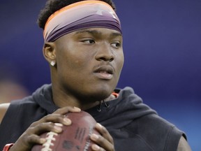Ohio State quarterback Dwayne Haskins throws during a drill at the NFL football scouting combine, Saturday, March 2, 2019, in Indianapolis.