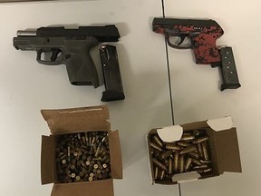 A 9-mm Taurus semi-automatic handgun and a loaded Ruger 380 semi-automatic handgun allegedly seized during an investigation April 14, 2019.