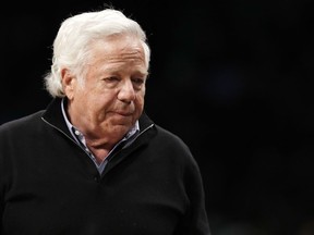 In this April 10, 2019, file photo, New England Patriots owner Robert Kraft leaves his seat during an NBA basketball game between the Brooklyn Nets and the Miami Heat, in New York.