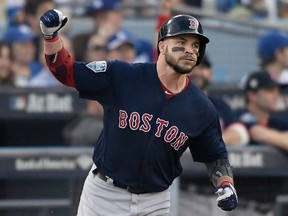 Steve Pearce of the Boston Red Sox celebrates his first inning two-run home run against the Los Angeles Dodgers in Game Five of the 2018 World Series at Dodger Stadium on October 28, 2018 in Los Angeles, California.  (KEVORK DJANSEZIAN/Getty Images)