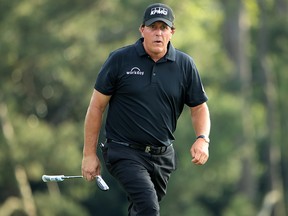 Phil Mickelson of the United States reacts on the 18th green during the third round of the Masters at Augusta National Golf Club on April 13, 2019 in Augusta. (Andrew Redington/Getty Images)