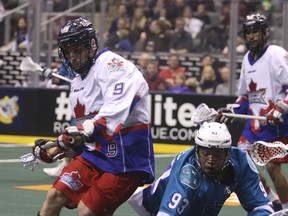The Rock's Johnny Powless (seen at right with the Rochester Knighthawks) aims to create some magic when the Rock takes on the Buffalo Bandits on Friday night. (Jack Boland/Toronto Sun)
