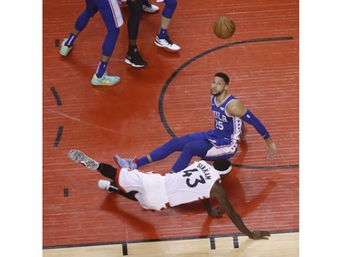 Toronto Raptors Pascal Siakam PF (43) fouled by Philadelphia 76ers Ben Simmons PG (25) during the first half in Toronto, Ont. on Sunday April 28, 2019. Jack Boland/Toronto Sun/Postmedia Network